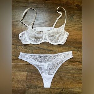 DKNY white lace 32B bra, M white panties and M thong. Like new.